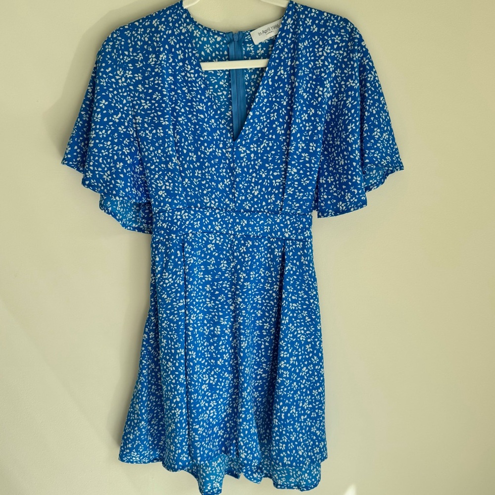 In April 1986 Blue Floral Flutter Sleeve Romper (Estimated XS/S)